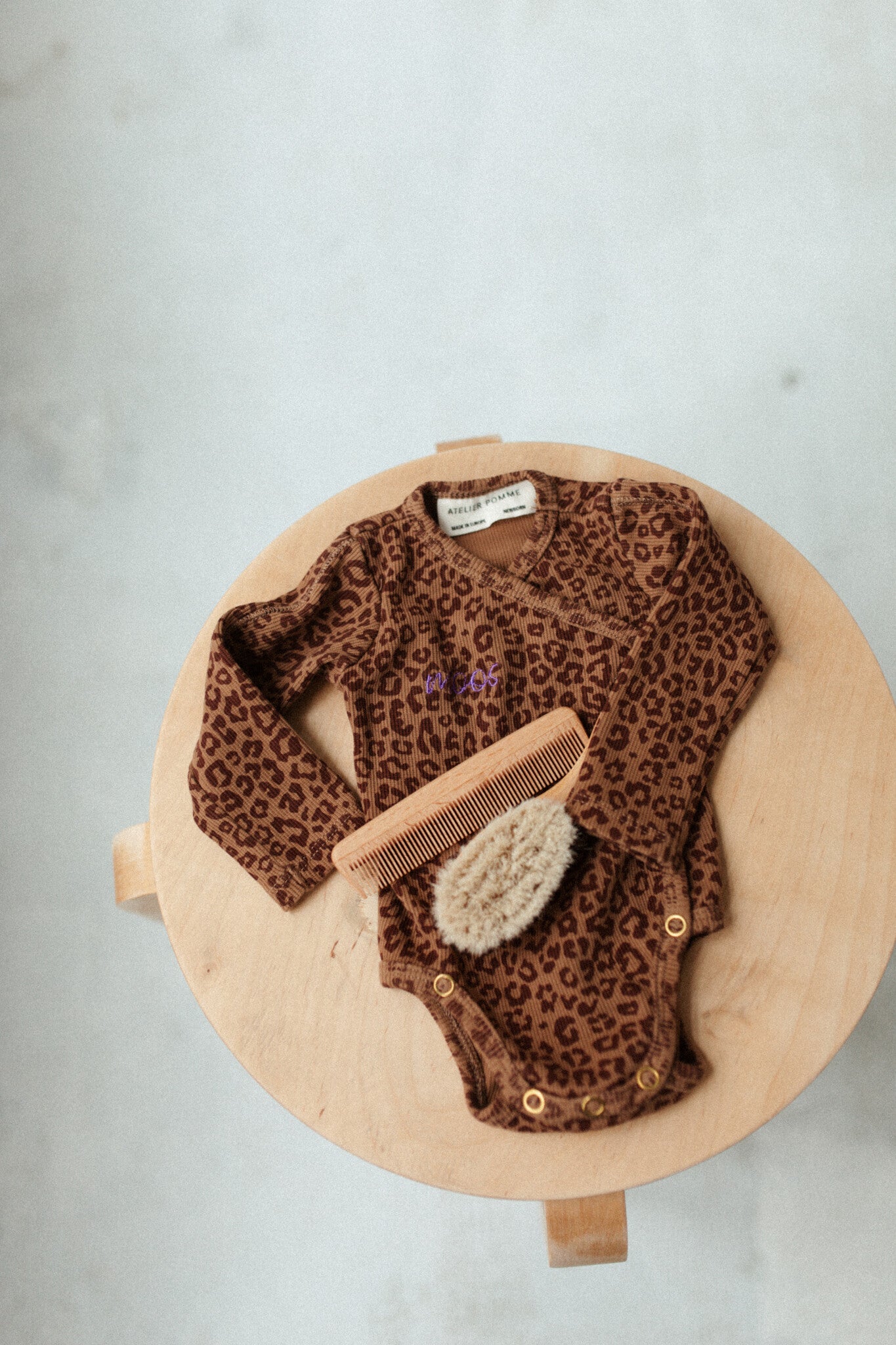 Romper wrap the baby leopard