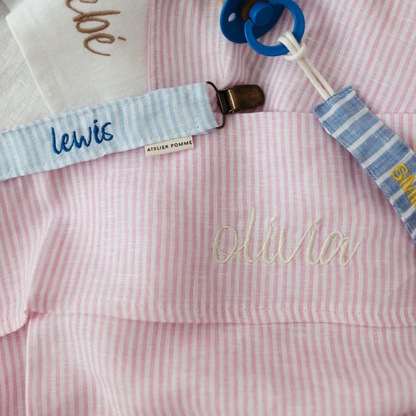 laken met gepersonaliseerde tekst, speenkoorden en gepersonaliseerde tekst