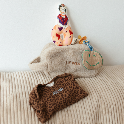 Rammelaar, etui, romper en speendoek