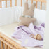lakentje voor in baby bed of maxi-cosy in de kleur lila