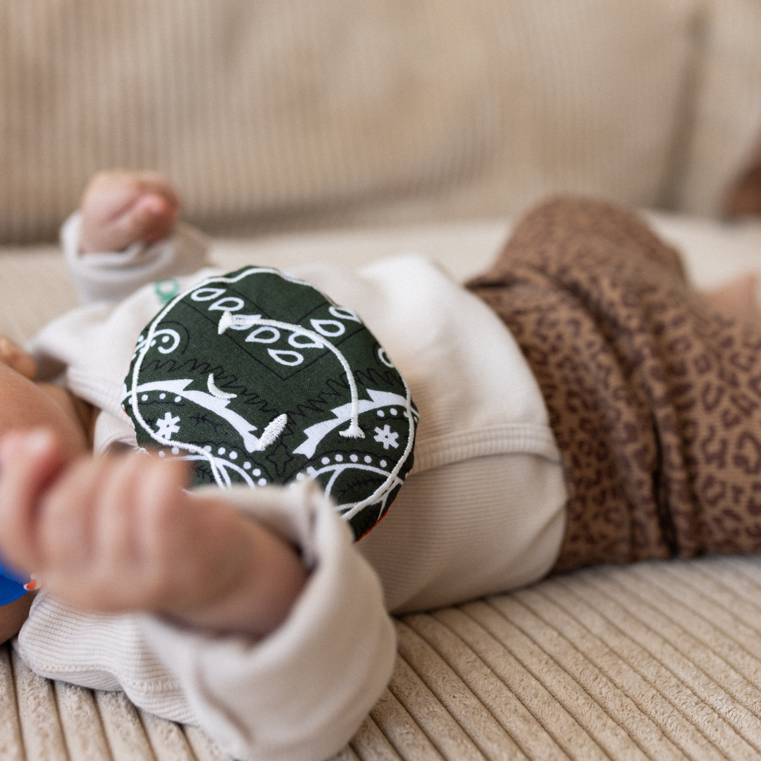 baby met speendoekje