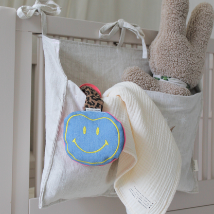 speenkoord van denim in roze, blauw en geel met vrolijke smiley