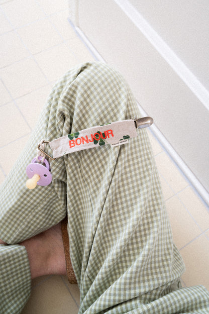 Speenkoord met gepersonaliseerde tekst erop