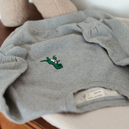 grijze sweater met icoon. 