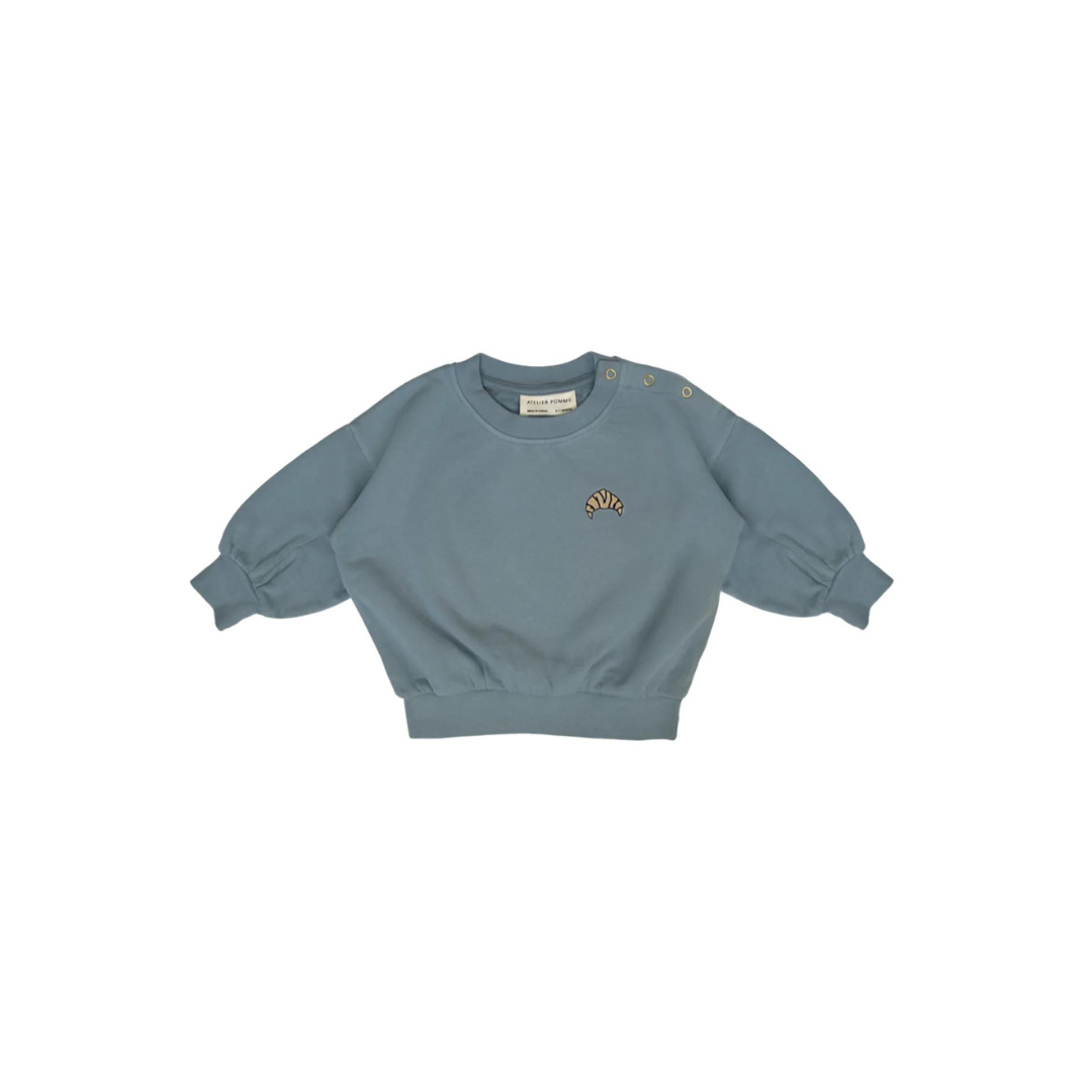 blauwe sweater met icoon. 